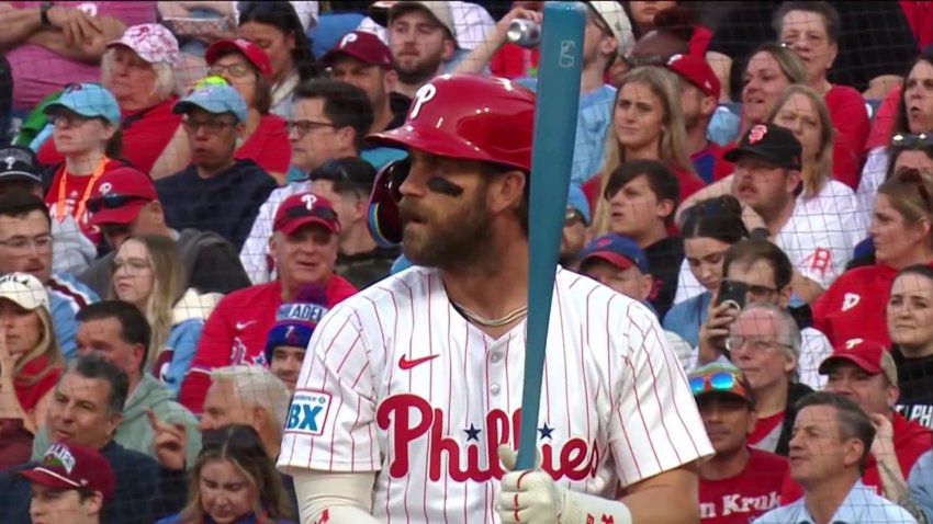 Philadelphia Phillie Bryce Harper carries a baby blue bat for a gender reveal during his first at bat on Monday, April 14, 2025.