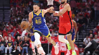 Apr 20, 2025; Houston, Texas, USA; Golden State Warriors guard Stephen Curry (30) controls the ball as Houston Rockets forward Dillon Brooks (9) defends during the second quarter at Toyota Center. Mandatory Credit: Troy Taormina-Imagn Images