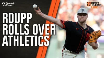 Roupp stifles Athletics' bats in Giants' extra-inning win