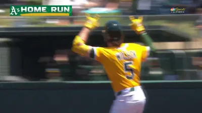 Wilson hits first career leadoff homer in Athletics-Phillies game