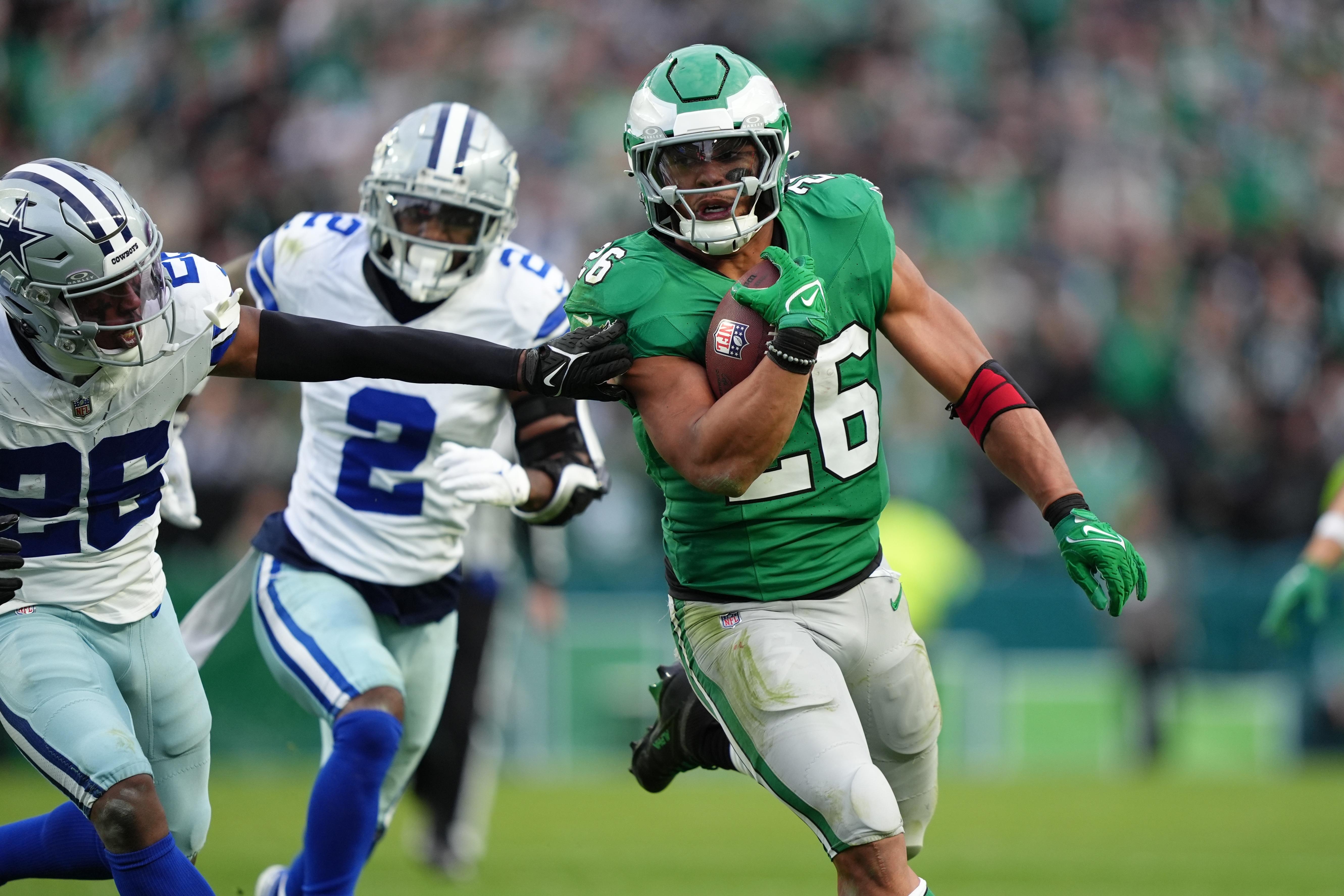Eagles running back Saquon Barkley carries the ball against Dallas Cowboys