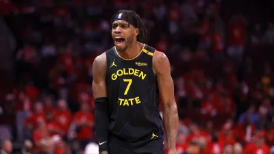 HOUSTON, TEXAS – MAY 04: Buddy Hield #7 of the Golden State Warriors reacts against the Houston Rockets after making a three-point basket during the fourth quarter in Game Seven of the Western Conference First Round NBA Playoffs at Toyota Center on May 04, 2025 in Houston, Texas. NOTE TO USER: User expressly acknowledges and agrees that, by downloading and or using this photograph, User is consenting to the terms and conditions of the Getty Images License Agreement. (Photo by Tim Warner/Getty Images)