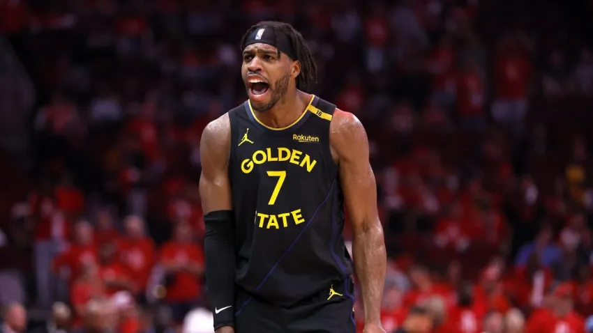 HOUSTON, TEXAS – MAY 04: Buddy Hield #7 of the Golden State Warriors reacts against the Houston Rockets after making a three-point basket during the fourth quarter in Game Seven of the Western Conference First Round NBA Playoffs at Toyota Center on May 04, 2025 in Houston, Texas. NOTE TO USER: User expressly acknowledges and agrees that, by downloading and or using this photograph, User is consenting to the terms and conditions of the Getty Images License Agreement. (Photo by Tim Warner/Getty Images)