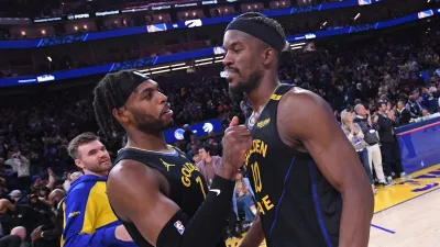 SAN FRANCISCO, CA – MARCH 20: Buddy Hield #7 and Jimmy Butler #10 of the Golden State Warriors embrace after the game against the Toronto Raptors on March 20, 2025 at Chase Center in San Francisco, California. NOTE TO USER: User expressly acknowledges and agrees that, by downloading and or using this photograph, user is consenting to the terms and conditions of Getty Images License Agreement. Mandatory Copyright Notice: Copyright 2025 NBAE(Photo by Noah Graham/NBAE via Getty Images)