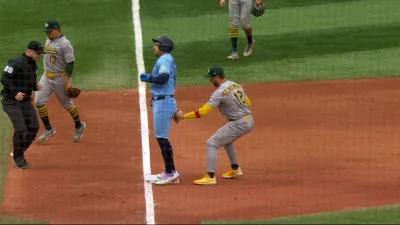Athletics tag Springer out as he bounces on base in bizarre play