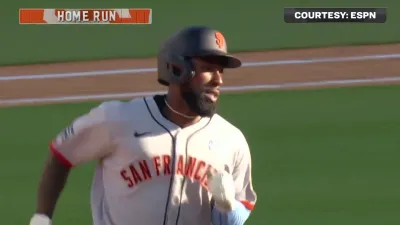 Johnson blasts first Giants' homer to cut Dodgers' lead