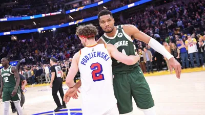 SAN FRANCISCO, CA – MARCH 18: Giannis Antetokounmpo #34 of the Milwaukee Bucks hugs Brandin Podziemski #2 of the Golden State Warriors after the game on March 18, 2025 at Chase Center in San Francisco, California. NOTE TO USER: User expressly acknowledges and agrees that, by downloading and or using this photograph, user is consenting to the terms and conditions of Getty Images License Agreement. Mandatory Copyright Notice: Copyright 2025 NBAE (Photo by Noah Graham/NBAE via Getty Images)