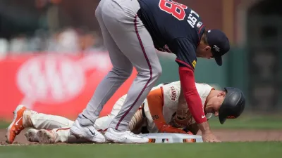 SAN FRANCISCO, CALIFORNIA – JUNE 08: Matt Chapman #26 of the San Francisco Giants gets picked off at first base tagged out by Matt Olson #28 of the Atlanta Braves in the bottom of the eighth inning of a major league baseball game at Oracle Park on June 08, 2025 in San Francisco, California. (Photo by Thearon W. Henderson/Getty Images)