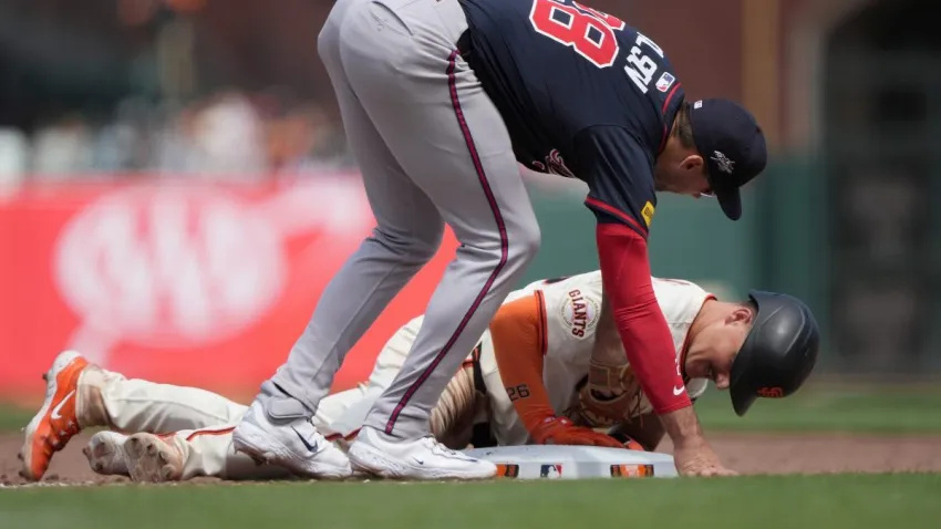 SAN FRANCISCO, CALIFORNIA – JUNE 08: Matt Chapman #26 of the San Francisco Giants gets picked off at first base tagged out by Matt Olson #28 of the Atlanta Braves in the bottom of the eighth inning of a major league baseball game at Oracle Park on June 08, 2025 in San Francisco, California. (Photo by Thearon W. Henderson/Getty Images)