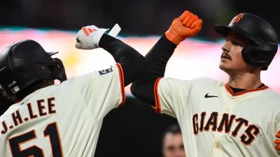Jun 4, 2025; San Francisco, California, USA; San Francisco Giants third baseman Matt Chapman (26) celebrates his two-run home run with center fielder Jung Hoo Lee (51) against the San Diego Padres in the sixth inning at Oracle Park. Mandatory Credit: Eakin Howard-Imagn Images