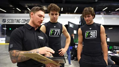 BUFFALO, NEW YORK – JUNE 7: Michael Misa #77 and Brady Martin #90 have receive instructions for testing from staff during the 2025 NHL Scouting Combine at the LECOM Harborcenter on June 7, 2025 in Buffalo, New York. (Photo by Bill Wippert/NHLI via Getty Images)