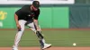 Rafael Devers' first base debut with Giants delayed by minor back injury