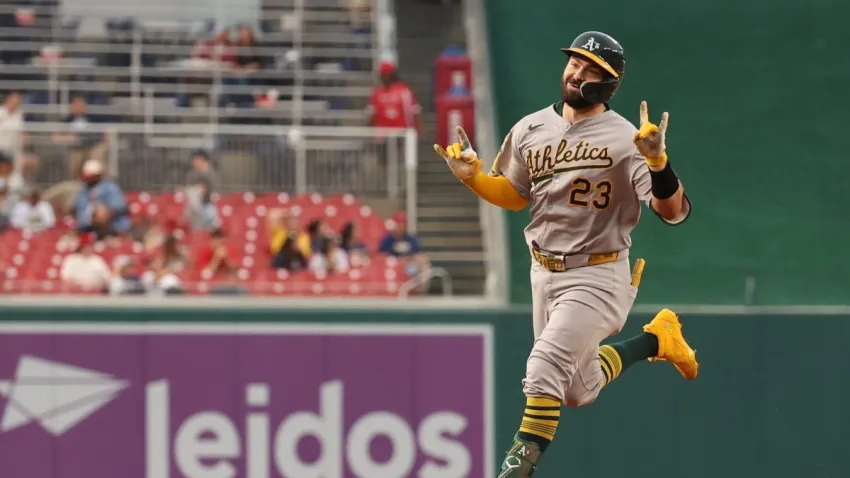 Aug 5, 2025; Washington, District of Columbia, USA; Athletics catcher Shea Langeliers (23) gestures to his dugout while rounding the bases after hitting a leadoff home run against the Washington Nationals during the first inning at Nationals Park. Mandatory Credit: Geoff Burke-Imagn Images