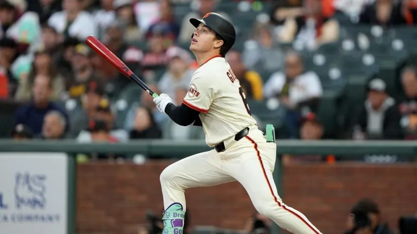 SAN FRANCISCO, CALIFORNIA – AUGUST 11: Drew Gilbert #61 of the San Francisco Giants hits a single against the San Diego Padres in the bottom of the third inning at Oracle Park on August 11, 2025 in San Francisco, California. The base hit was Gilbert’s first career major league hit. (Photo by Thearon W. Henderson/Getty Images)