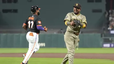 SAN FRANCISCO, CALIFORNIA – AUGUST 12: Luis Arraez #4 of the San Diego Padres reacts after catching a foul pop-up hit by Heliot Ramos #17 of the San Francisco Giants ending the six inning at Oracle Park on August 12, 2025 in San Francisco, California. (Photo by Thearon W. Henderson/Getty Images)