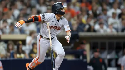 SAN DIEGO, CALIFORNIA – AUGUST 19: Jung Hoo Lee #51 of the San Francisco Giants connects for a double during the fifth inning of a game against the San Diego Padres at Petco Park on August 19, 2025 in San Diego, California. (Photo by Sean M. Haffey/Getty Images)