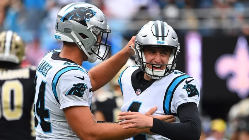 Sep 25, 2022; Charlotte, North Carolina, USA; Carolina Panthers place kicker Eddy Pineiro (4) reacts with long snapper JJ Jansen (44) after kicking a field goal in the second quarter at Bank of America Stadium. Mandatory Credit: Bob Donnan-USA TODAY Sports