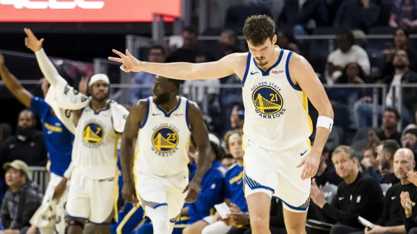 Oct 8, 2025; San Francisco, California, USA;  Golden State Warriors center Quinten Post (21) gestures after hitting a three-point shot against the Portland Trail Blazers during the second quarter at Chase Center. Mandatory Credit: John Hefti-Imagn Images