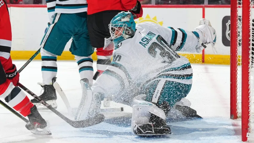 NEWARK, NJ – OCTOBER 24: Yaroslav Askarov #30 of the San Jose Sharks defends his net in the first period of the game against the New Jersey Devils on October 24, 2025 at the Prudential Center in Newark, New Jersey.  (Photo by Rich Graessle/NHLI via Getty Images)