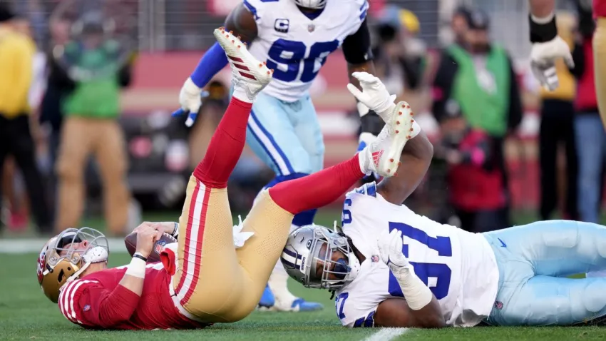 Jan 22, 2023; Santa Clara, California, USA; Dallas Cowboys defensive tackle Osa Odighizuwa (97) sacks San Francisco 49ers quarterback Brock Purdy (13) during the first quarter of a NFC divisional round game at Levi’s Stadium. Mandatory Credit: Kyle Terada-USA TODAY Sports