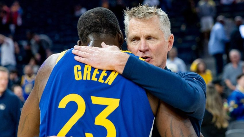Mar 10, 2026; San Francisco, California, USA; Golden State Warriors head coach Steve Kerr and Golden State Warriors forward Draymond Green (23) embrace after the game against the Chicago Bulls at Chase Center. Mandatory Credit: Bob Kupbens-Imagn Images