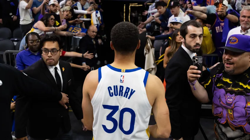 Apr 17, 2026; Phoenix, Arizona, USA; Detailed view of the jersey of Golden State Warriors guard Stephen Curry (30) as he walks off the court after losing to the Phoenix Suns during the play-in rounds of the 2026 NBA Playoffs at Mortgage Matchup Center. Mandatory Credit: Mark J. Rebilas-Imagn Images