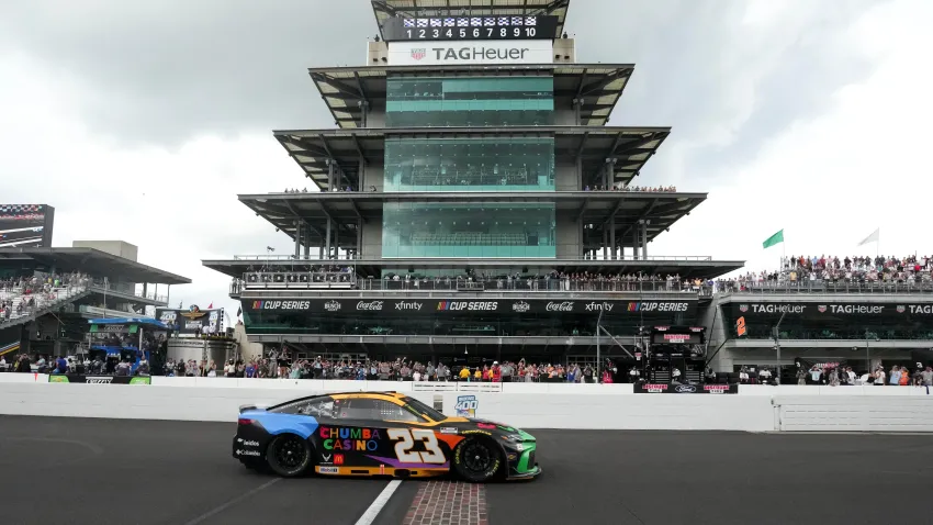 Bubba Wallace (23) crosses the yard of bricks
