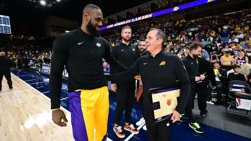 PALM SPRINGS, CA – OCTOBER 19: LeBron James #23 of the Los Angeles Lakers and Head Coach Frank Vogel of the Phoenix Suns smile before the game on October 19, 2023 at the Acrisure Arena in Palm Springs, California. NOTE TO USER: User expressly acknowledges and agrees that, by downloading and/or using this Photograph, user is consenting to the terms and conditions of the Getty Images License Agreement. Mandatory Copyright Notice: Copyright 2023 NBAE (Photo by Adam Pantozzi/NBAE via Getty Images)