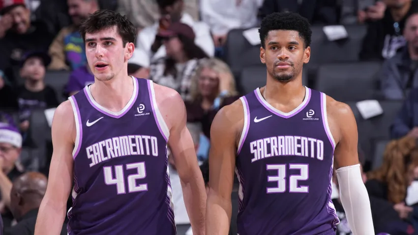 SACRAMENTO, CA – DECEMBER 21: Maxime Raynaud #42 and Dylan Cardwell #32 of the Sacramento Kings look on during the game against the Houston Rockets on December 21, 2025 at Golden 1 Center in Sacramento, California. NOTE TO USER: User expressly acknowledges and agrees that, by downloading and or using this photograph, User is consenting to the terms and conditions of the Getty Images Agreement. Mandatory Copyright Notice: Copyright 2025 NBAE (Photo by Rocky Widner/NBAE via Getty Images)