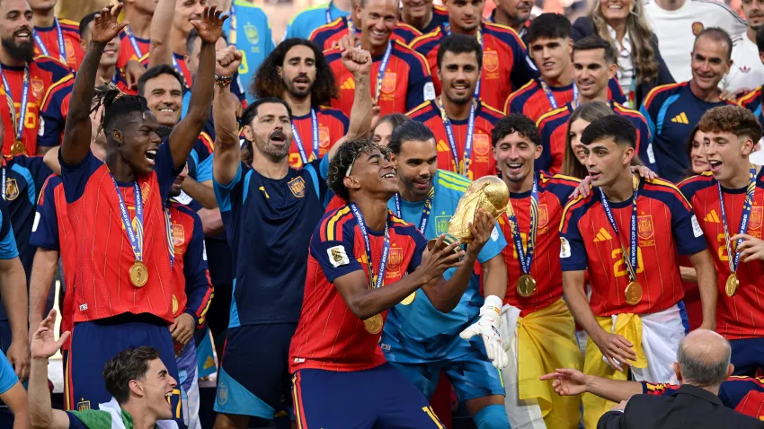 Lamine Yamal #19 of Spain lifts the FIFA World Cup Winner’s Trophy.