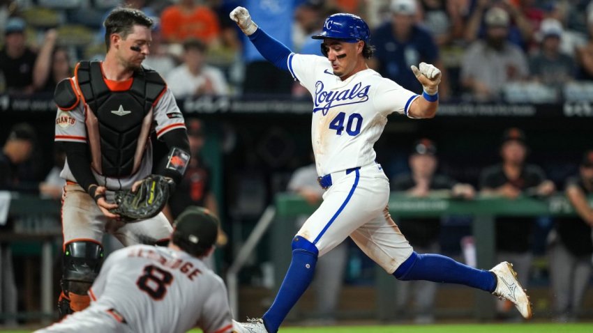 KANSAS CITY, MISSOURI – JULY 20: Josh Rojas #40 of the Kansas City Royals scores the game-winning run against Daniel Susac #6 and Bryce Eldridge #8 of the San Francisco Giants during the ninth inning at Kauffman Stadium on July 20, 2026 in Kansas City, Missouri. (Photo by Jay Biggerstaff/Getty Images)
