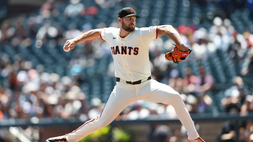 Aug 12, 2026; San Francisco, California, USA; San Francisco Giants starting pitcher Adrian Houser (12) pitches during the first inning against the Houston Astros at Oracle Park. Mandatory Credit: Sergio Estrada-Imagn Images
