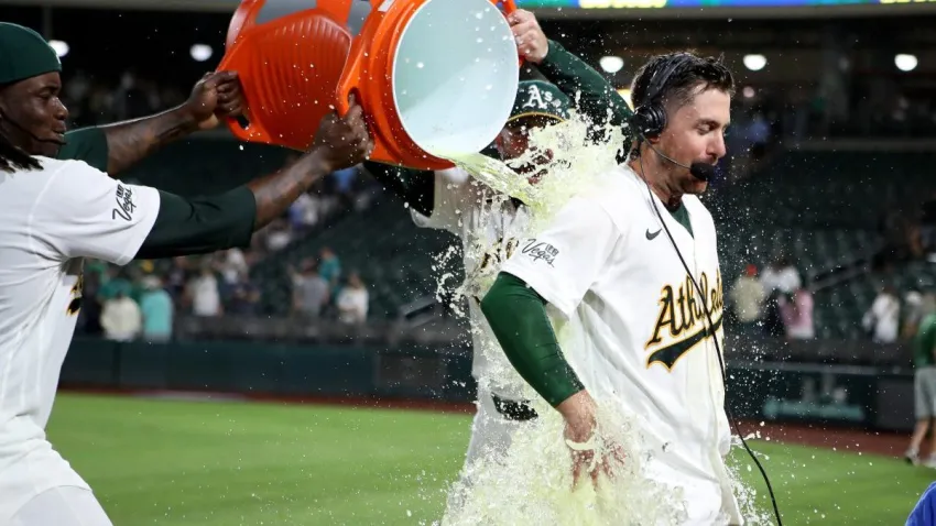 Sep 11, 2026; West Sacramento, California, USA;  Athletics short stop Donovan Walton (29) is doused with Gatorade after hitting a walk-off two-run home run against Seattle Mariners pitcher Eduard Bazardo (not pictured) at Sutter Health Park.  Mandatory Credit: Dennis Lee-Imagn Images