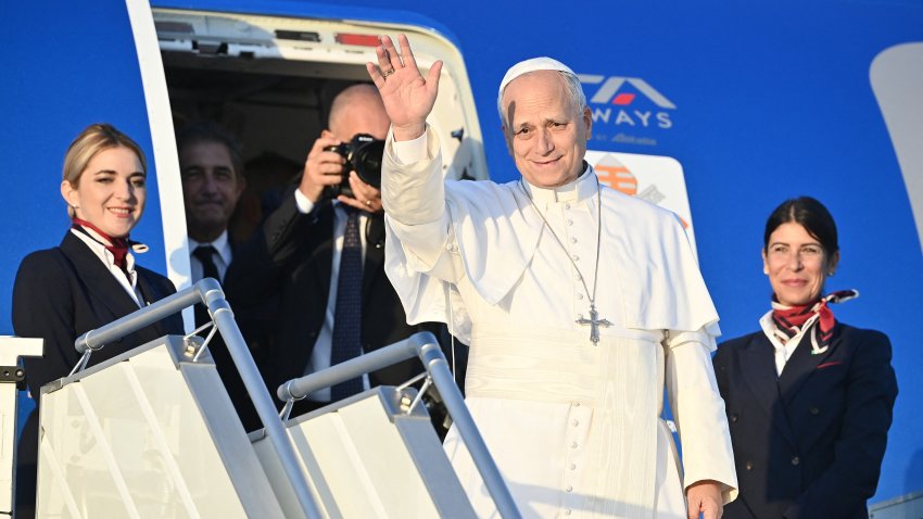 Pope Leo XIV boards his plane heading to Paris at Rome's Fiumicino airport on September 25, 2026.
