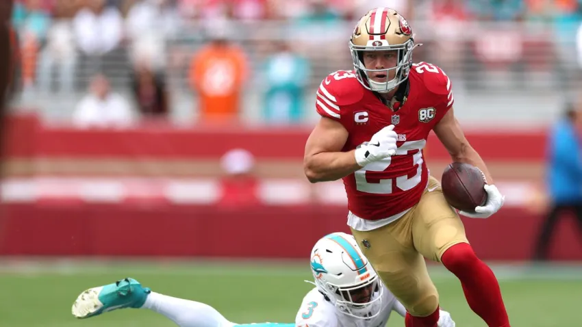 SANTA CLARA, CALIFORNIA – SEPTEMBER 20: Christian McCaffrey #23 of the San Francisco 49ers runs against Chris Johnson #3 of the Miami Dolphins in the first quarter of a game at Levi’s Stadium on September 20, 2026 in Santa Clara, California. (Photo by Ezra Shaw/Getty Images)
