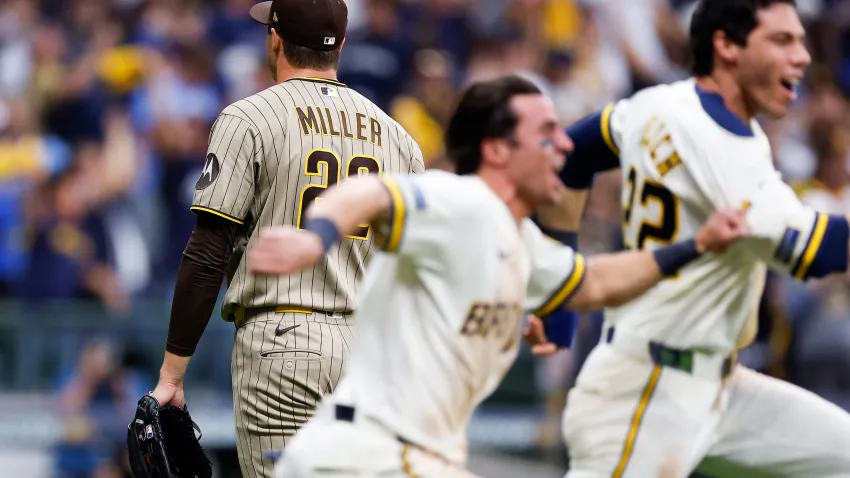 Milwaukee, Wisconsin – October 04: Mason Miller #22 of the San Diego Padres walks off the field as Milwaukee Brewers players celebrate defeating the Friars in Game 2 of the National League Division Series at American Family Field on Sunday, Oct. 4, 2026 in Milwaukee, Wisconsin. (Photo by Meg McLaughlin / The San Diego Union-Tribune via Getty Images)
