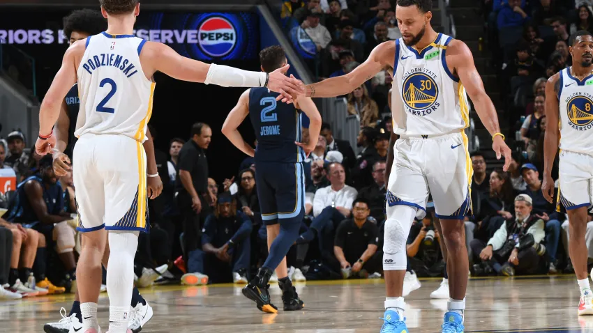 SAN FRANCISCO, CA – OCTOBER 23: Brandin Podziemski #2 & Stephen Curry #30 of the Golden State Warriors high five during the game against the Memphis Grizzlies on October 23, 2026 at Chase Center in San Francisco, California. NOTE TO USER: User expressly acknowledges and agrees that, by downloading and or using this photograph, user is consenting to the terms and conditions of Getty Images License Agreement. Mandatory Copyright Notice: Copyright 2026 NBAE (Photo by Noah Graham/NBAE via Getty Images)