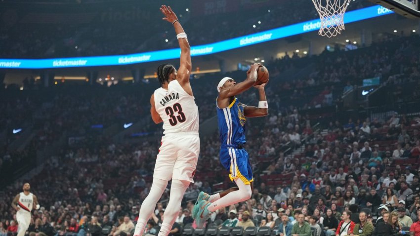 PORTLAND, OREGON – OCTOBER 07: Brandon Williams #12 of the Golden State Warriors goes up for a shot against Toumani Camara #33 of the Portland Trail Blazers during the first half of the preseason game at Moda Center on October 07, 2026 in Portland, Oregon. NOTE TO USER: User expressly acknowledges and agrees that, by downloading and or using this photograph, User is consenting to the terms and conditions of the Getty Images License Agreement. (Photo by Soobum Im/Getty Images)