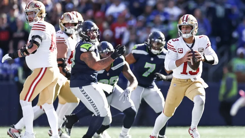 SEATTLE, WASHINGTON – OCTOBER 11: Brock Purdy #13 of the San Francisco 49ers runs with the ball during the second quarter against the Seattle Seahawks at Lumen Field on October 11, 2026 in Seattle, Washington. (Photo by Olivia Vanni/Getty Images)
