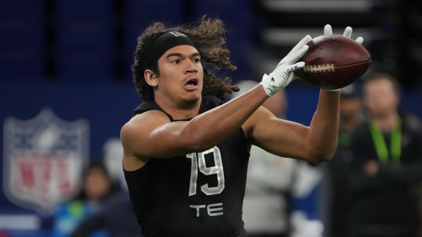 Mar 3, 2022; Indianapolis, IN, USA; Nevada tight end Cole Turner (TE19) goes through drills during the 2022 NFL Scouting Combine at Lucas Oil Stadium. Mandatory Credit: Kirby Lee-USA TODAY Sports